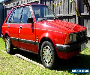 1982 FORD LASER KA GHIA 1.5L AUTOMATIC RED 5 DOOR HATCH AIR-CONDITIONING UNREG