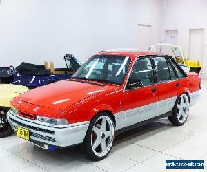 1987 Holden Commodore VL Berlina Red Manual M Sedan