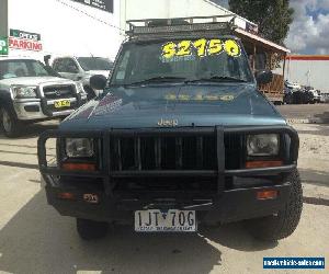 1998 Jeep Cherokee XJ Sport (4x4) Blue Automatic 4sp A Wagon