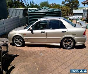 2002 Ford Laser KQ LXi Sedan 4dr Man 5sp 1.6