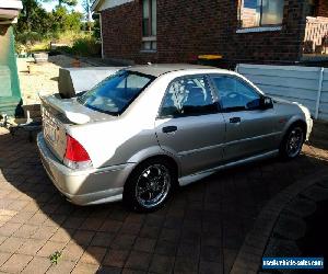 2002 Ford Laser KQ LXi Sedan 4dr Man 5sp 1.6