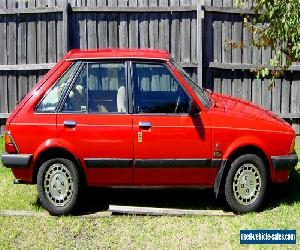 1982 FORD LASER KA GHIA 1.5L AUTOMATIC RED 5 DOOR HATCH AIR-CONDITIONING NO REG