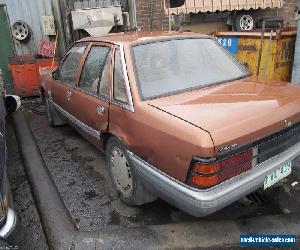 VK V8 5lt COMMODORE SEDAN  SLIGHT DAMAGE HOLDEN SUIT BROCK MOCK UP