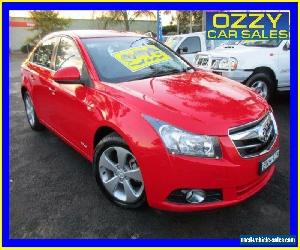 2010 Holden Cruze JG CDX Red Manual 5sp M Sedan