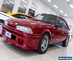 1988 Holden Commodore Berlina Burgundy Automatic 3sp A Sedan