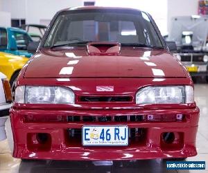 1988 Holden Commodore Berlina Burgundy Automatic 3sp A Sedan