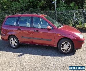 Burgundy Ford Focus Zetec estate car