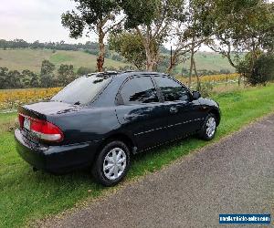 1998 Ford Laser LXI Sedan. 1.6L AUTO 152k RWC REGO