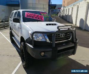 2012 Toyota Hilux KUN26R MY12 SR White Manual 5sp M 4D UTILITY