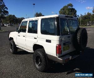 2012 Toyota Landcruiser VDJ76R GXL White Manual M Wagon