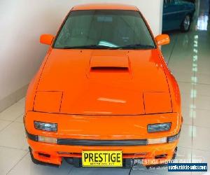 1986 Mazda RX7 Orange Automatic A Coupe