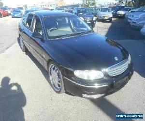 2001 Holden Statesman WH V6 Black Automatic 4sp A Sedan