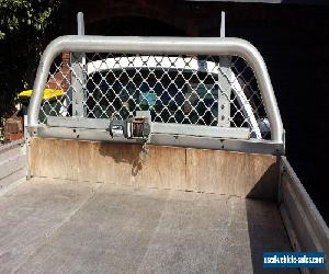 2007 Ford Falcon ute, 1 ton tray with drop sides