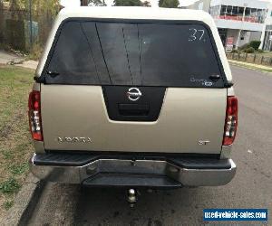 2009 Nissan Navara D40 ST (4x4) Gold Manual 6sp M Dual Cab Pick-up