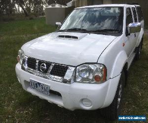 2010 NAVARA D22 STR TWIN CAB UTE WITH CANOPY