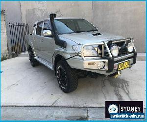 2009 Toyota Hilux KUN26R MY09 SR5 Utility Dual Cab 4dr Man 5sp, 4x4 955kg 3.0D