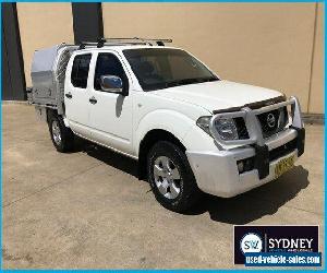 2006 Nissan Navara D40 RX Utility Dual Cab 4dr Man 6sp 4x4 875kg 2.5DT White M