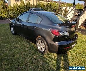 Mazda 3 Auto sedan. 7kms low reserve!!!