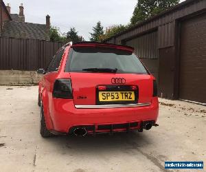 Audi RS6 red 92000 miles.