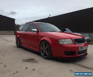 Audi RS6 red 92000 miles.