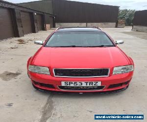 Audi RS6 red 92000 miles.