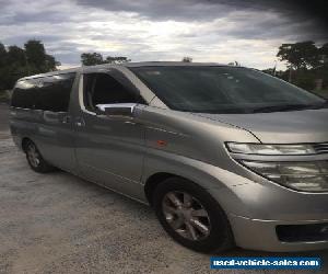 2002 Nissan elgrand van , seven seater ,gold in colour , body in good condition 