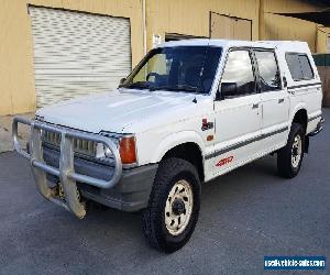 1995 FORD COURIER XL 4X4 DUAL CAB UTE 2.6L EFI PETROL MANUAL.....TOYOTA HILUX