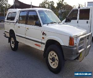 1995 FORD COURIER XL 4X4 DUAL CAB UTE 2.6L EFI PETROL MANUAL.....TOYOTA HILUX