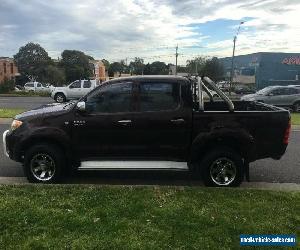 2005 Toyota Hilux KUN26R SR5 (4x4) Maroon Automatic 4sp A Dual Cab Pick-up