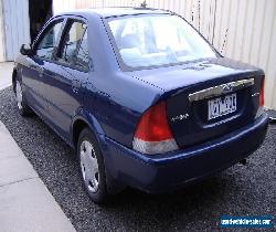 DAMAGED ford laser 2000 model auto for Sale