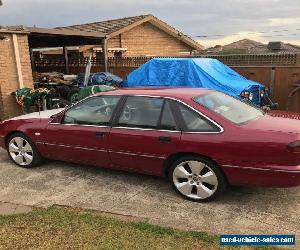 1995 RED HOLDEN SED