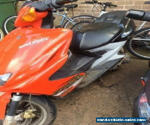 Yamaha Aerox Scooter in red.