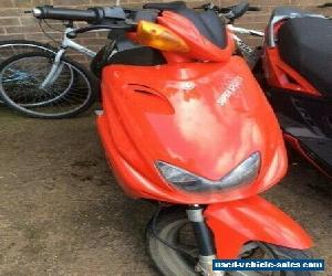 Yamaha Aerox Scooter in red.