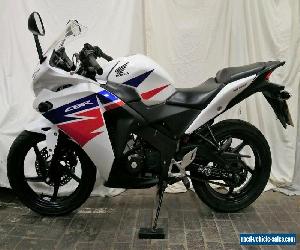 Honda CBR125 R CBR 2014 WHITE BLUE RED DATATOOL ALARM