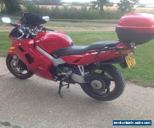 Honda vfr 800 full luggage , 34k 99 t reg red . Reliable bike , bargain vfr800