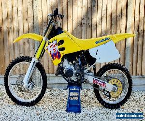 1995 Suzuki RM125 motocross cross bike, evo, full nut and bolt restoration.