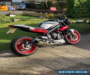 Triumph Street Triple 675 RX silver and red motorbike