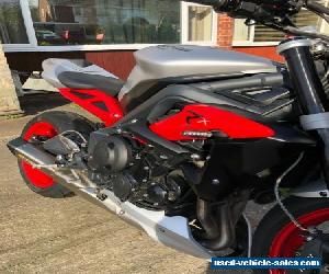 Triumph Street Triple 675 RX silver and red motorbike