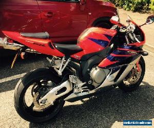 2005 HONDA CBR FIREBLADE 1000 RR-5 RED. LOW MILEAGE. IN NEAR SHOWROOM CONDITION.