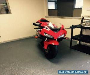 2005 HONDA CBR FIREBLADE 1000 RR-5 RED. LOW MILEAGE. IN NEAR SHOWROOM CONDITION.