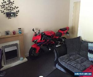 2005 HONDA CBR FIREBLADE 1000 RR-5 RED. LOW MILEAGE. IN NEAR SHOWROOM CONDITION.