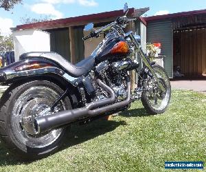 2006 CUSTOM HARLEY SOFTAIL....BIG $$$ SPENT