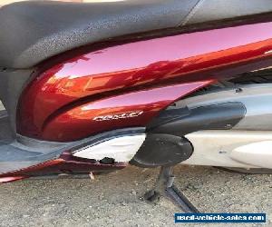 Honda SH300 scooter damaged WOV