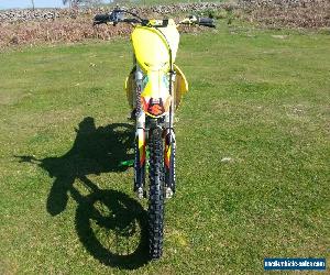 SUZUKI RMZ 250 2015,VERY CLEAN BIKE,FULL PRO CURCUIT,GOLD RIMS,NEW GRAPHICS,