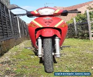 HONDA ANF 125-5. INNOVA. 2005. RED.