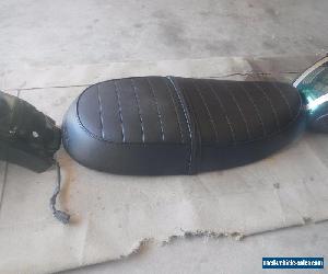 triumph tank seat guards and fly screen