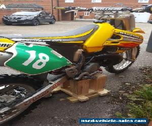 Suzuki rm 250 + protective gear