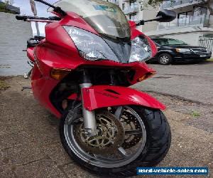 Red Honda VFR800Fi 2004 with OEM Topbox and Panniers
