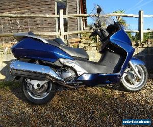 Honda Silver Wing FJS600 in blue under 15000 miles